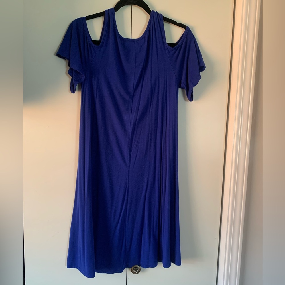 Size small blue dress with cut outs in the shoulders.